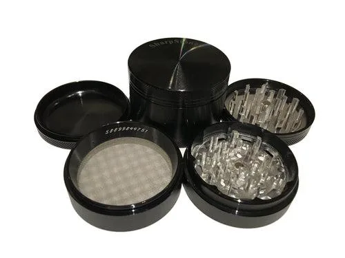 Black anodised aluminium four-piece herb shredder, 3.0 inch diameter, textured grip sides