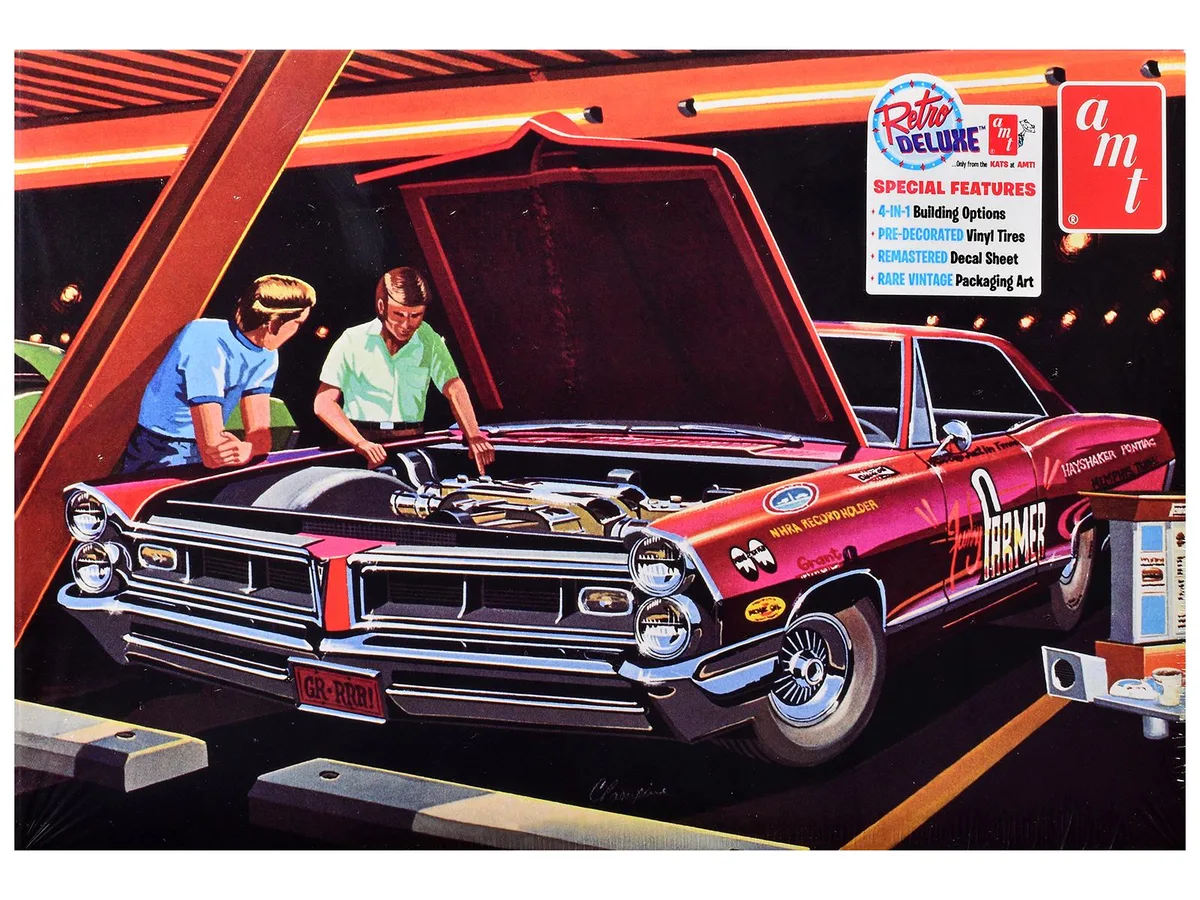 AMT AMT AMT1578 1/25 Scale 1965 Pontiac Grand Prix Show N Go Model Kit 138 Parts — product photo