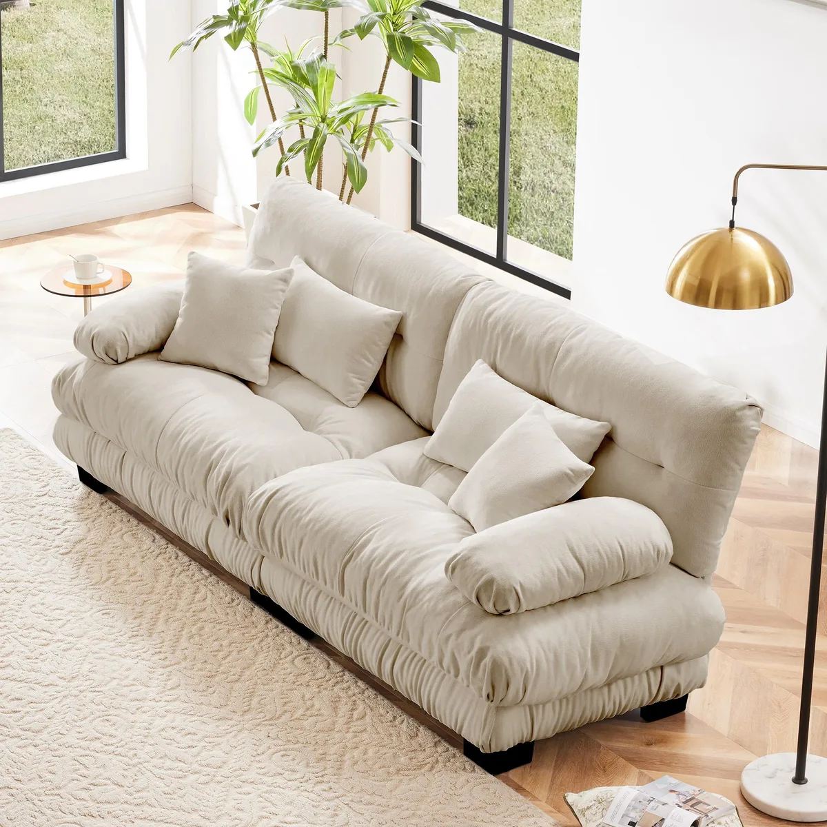 Light coffee chenille two-seater sofa with round bolster armrests and four matching pillows