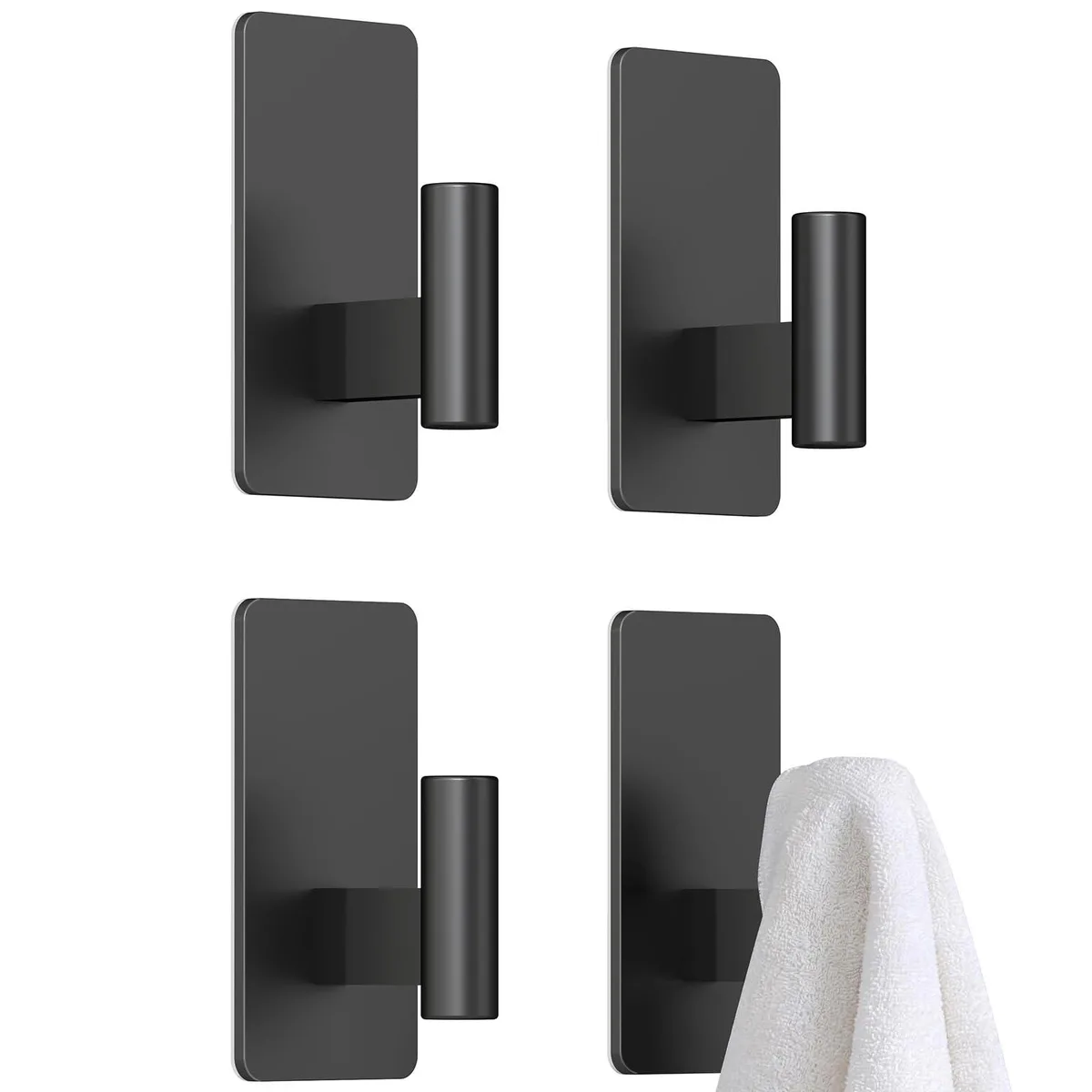 Four black adhesive hooks with wide rectangular base plates shown on a light surface