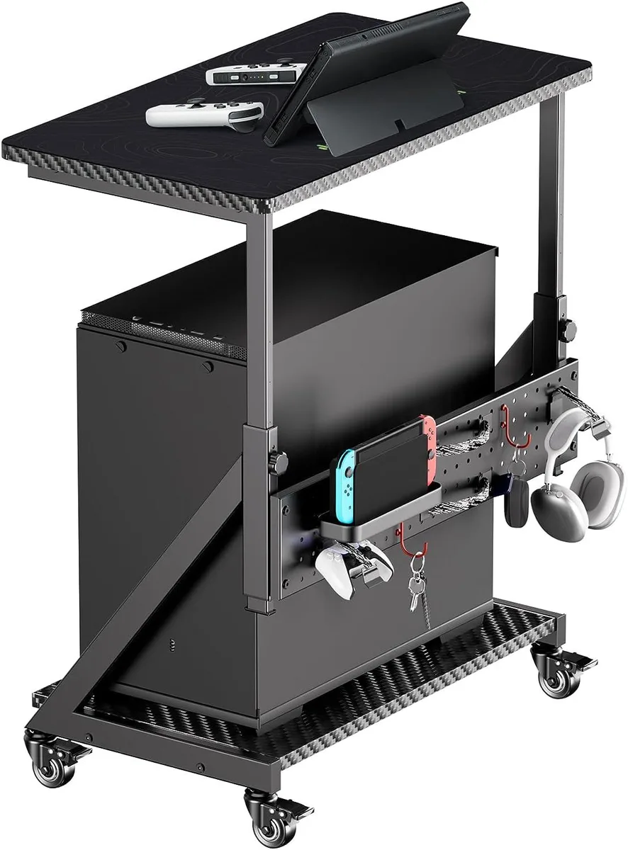 Black two-tier metal frame on four wheels, height-adjustable posts, power-strip tray, headphone hooks, mouse pad included