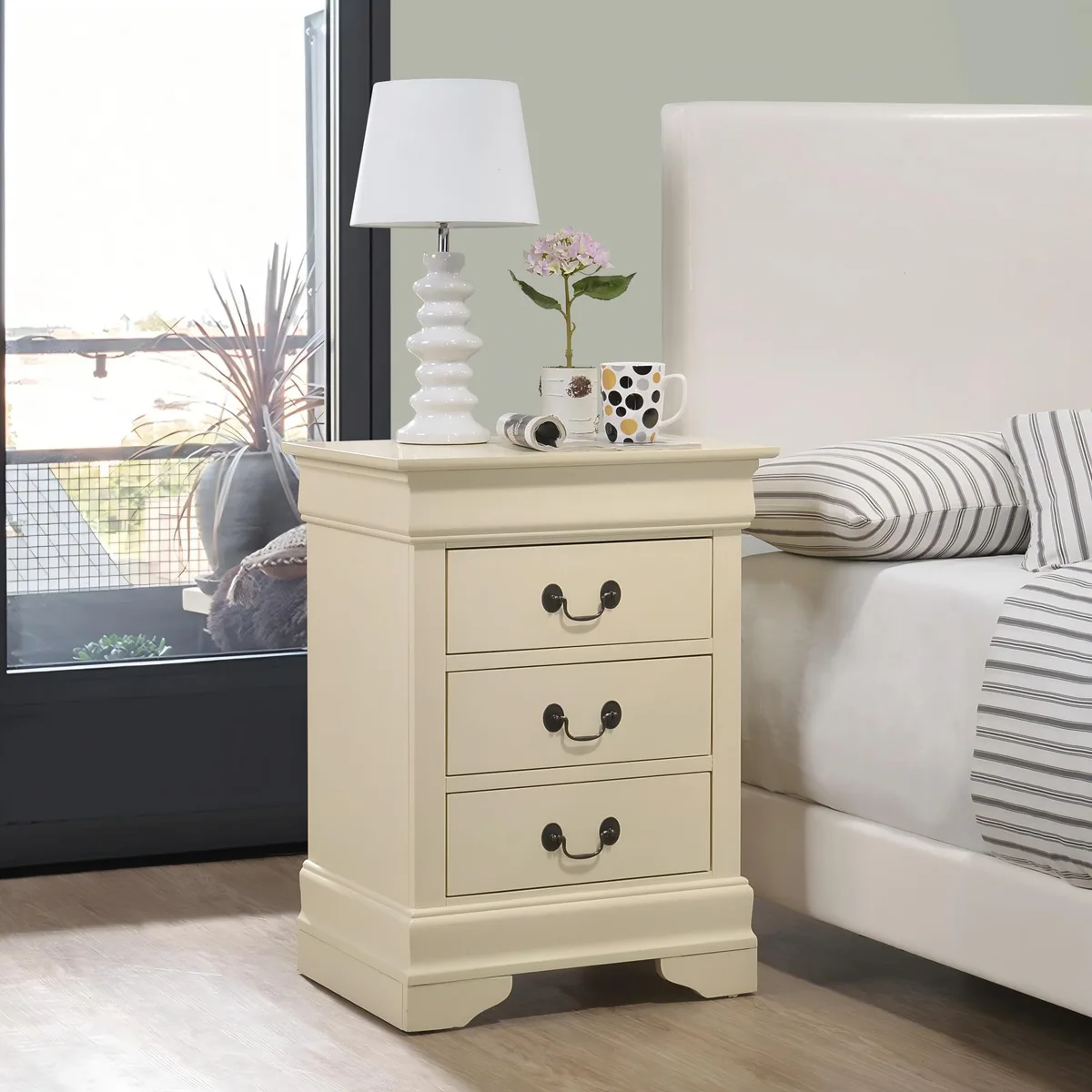 Beige particle-board nightstand with three drawers, 29H x 21W x 16D