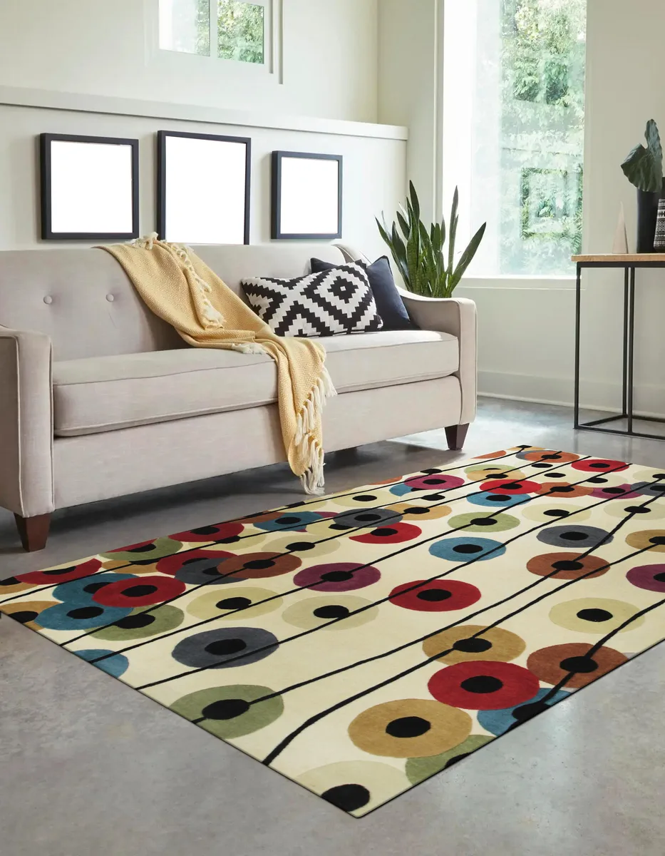 Hand-tufted wool area rug with neutral stripe pattern, plush low-shed pile, made in India