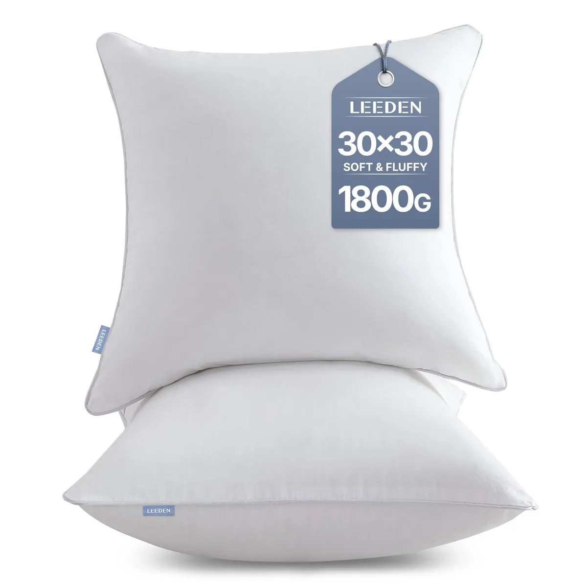 Two white square pillow inserts with cotton covers side by side