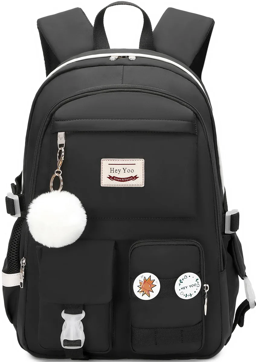 Black nylon laptop backpack with padded straps and fur ball charm