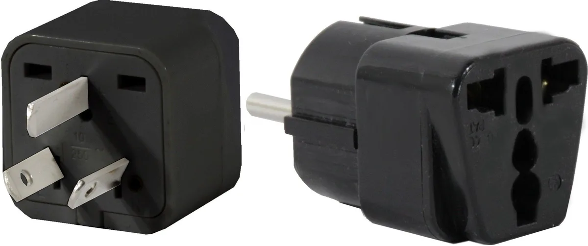 Two black travel power adapters Type I and Type E