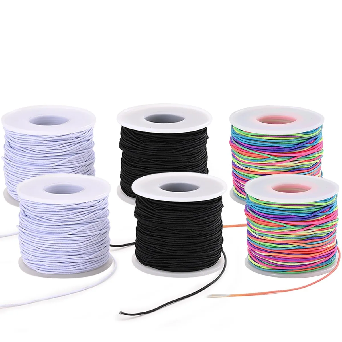 Six spools of 1 mm elastic cord in black white and rainbow colours