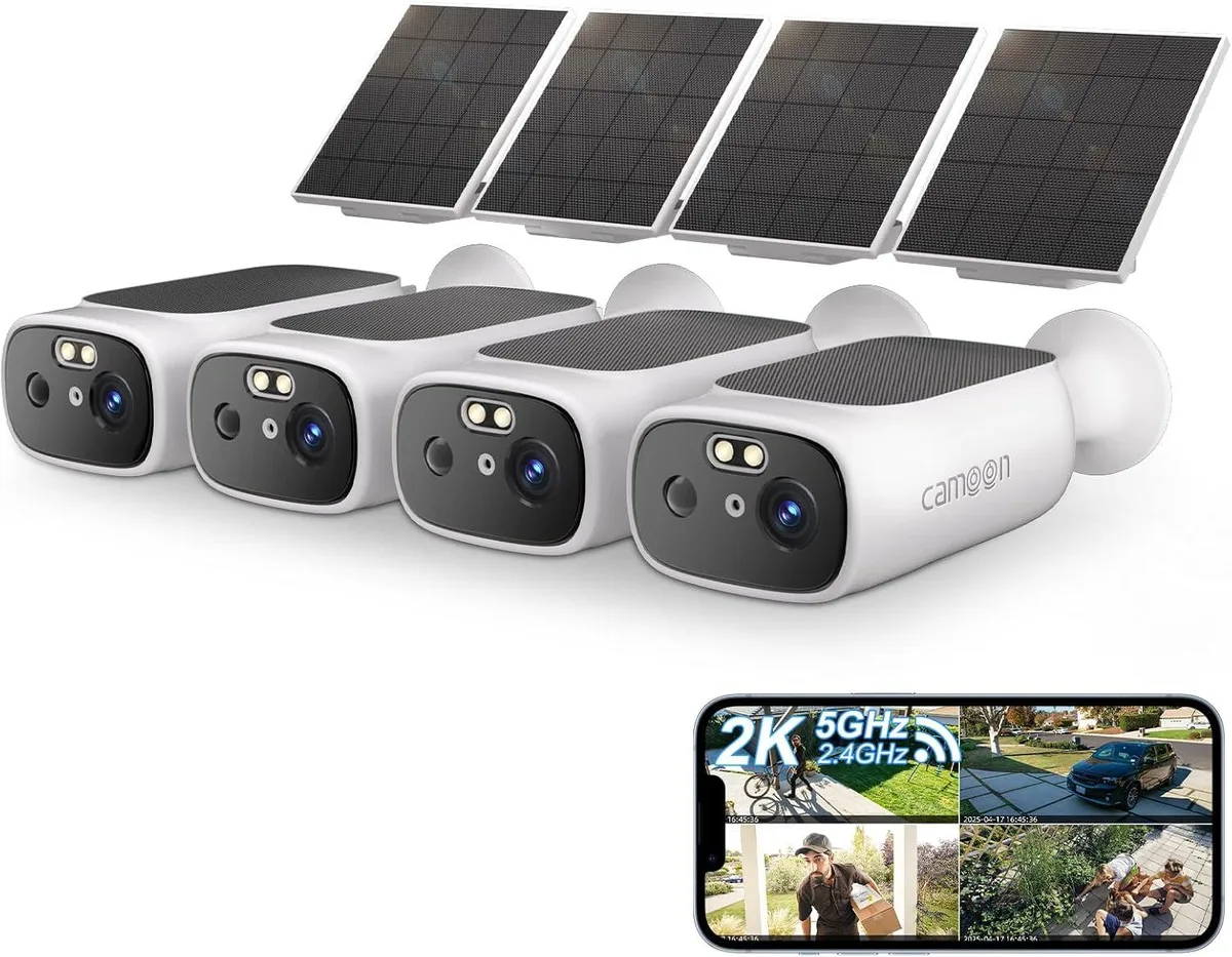 Four white bullet cameras with integrated solar panels on top