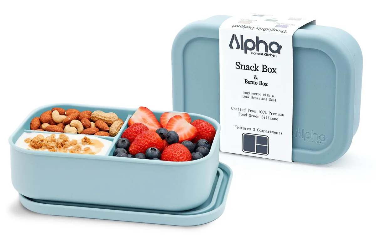 Red silicone bento box with three compartments and matching lid