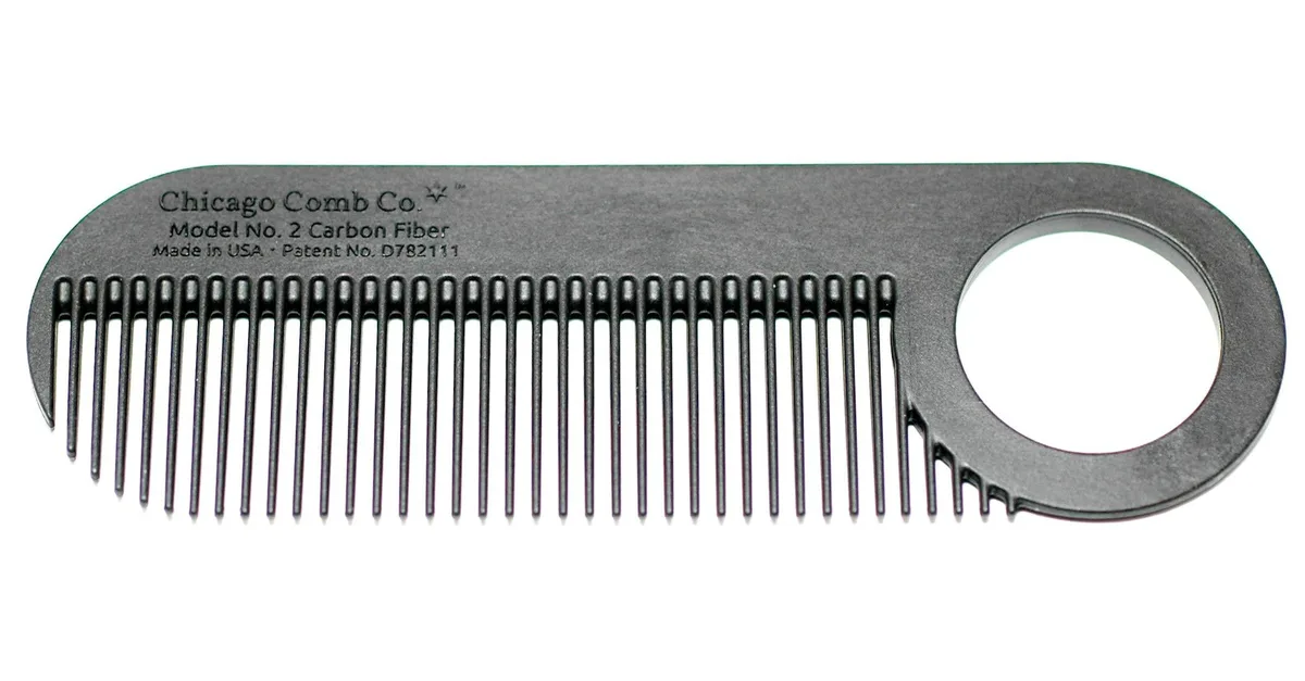 Small black carbon fibre comb with fine teeth and hanging loop