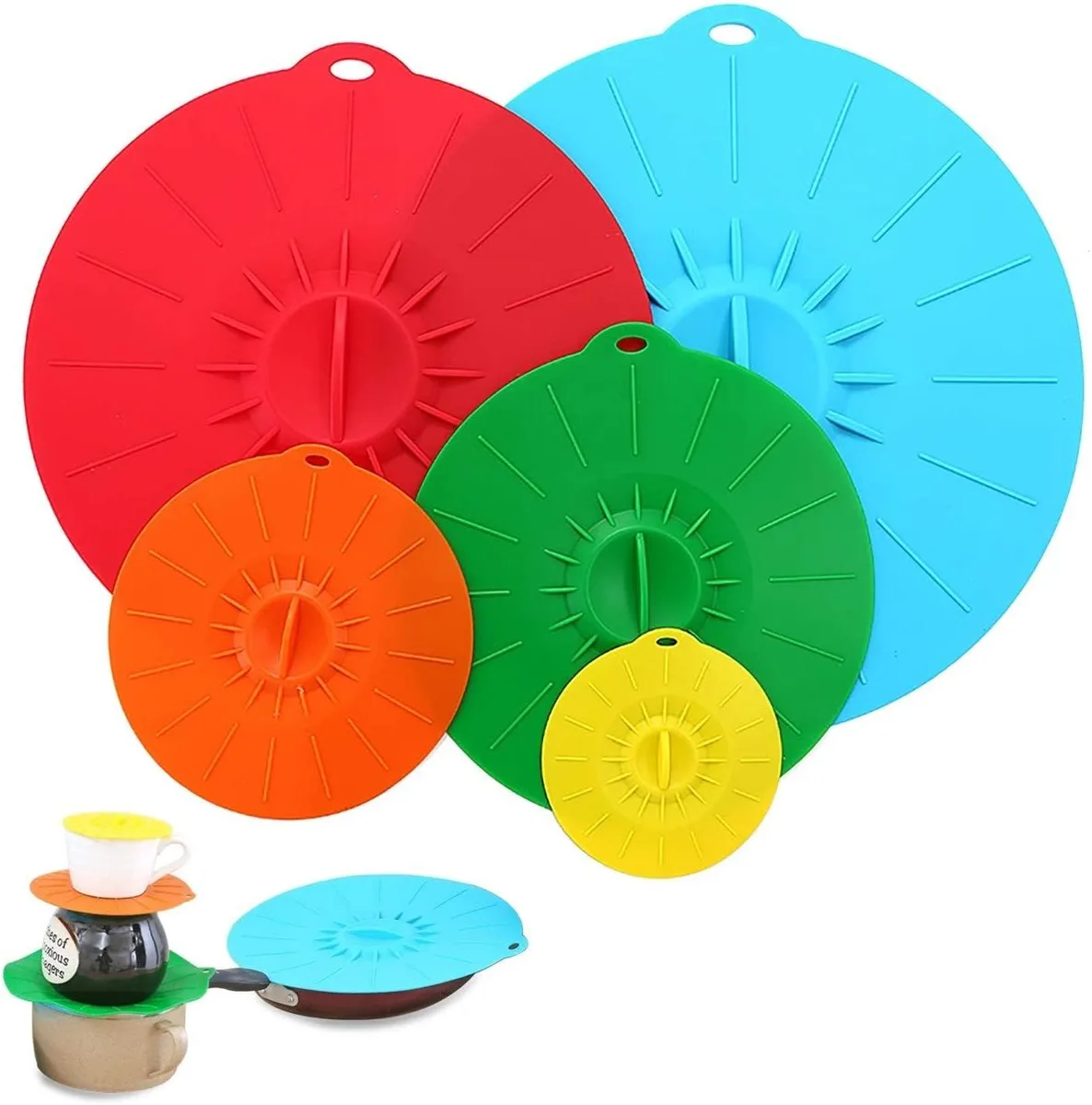 Five round silicone lids in graduated sizes stacked together, smooth matte finish with small handle tabs