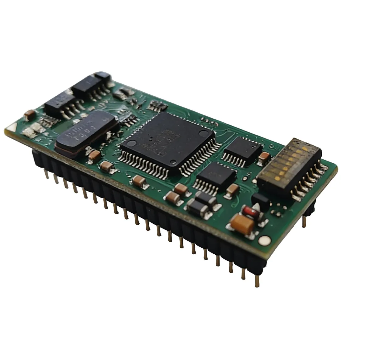 Green rectangular circuit board with electronic components and edge connector