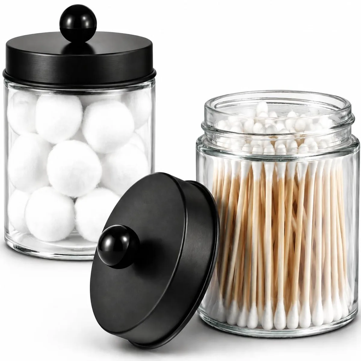Two black glass apothecary jars with metal lids, 8oz each