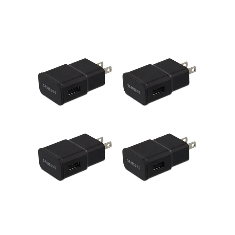 Four white Samsung wall chargers with folding prongs