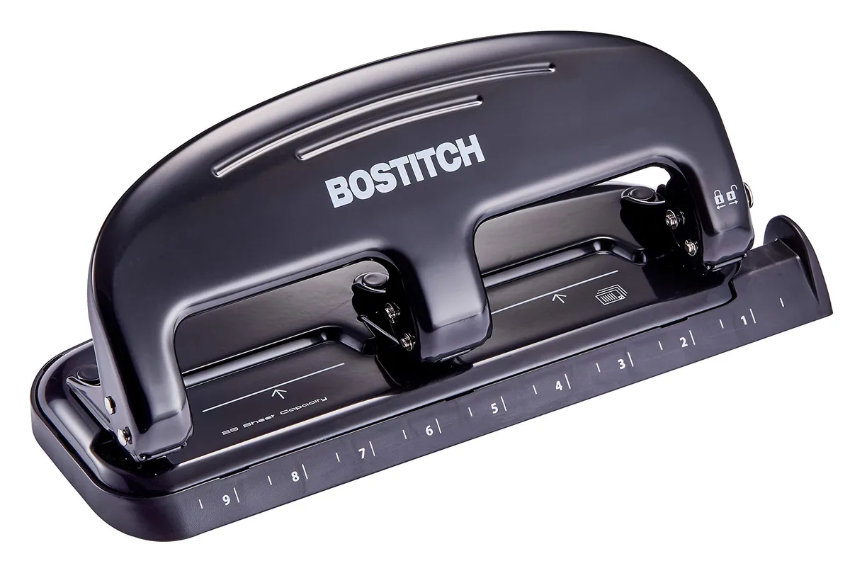 Silver and black metal three-hole punch with locking handle and rubber base