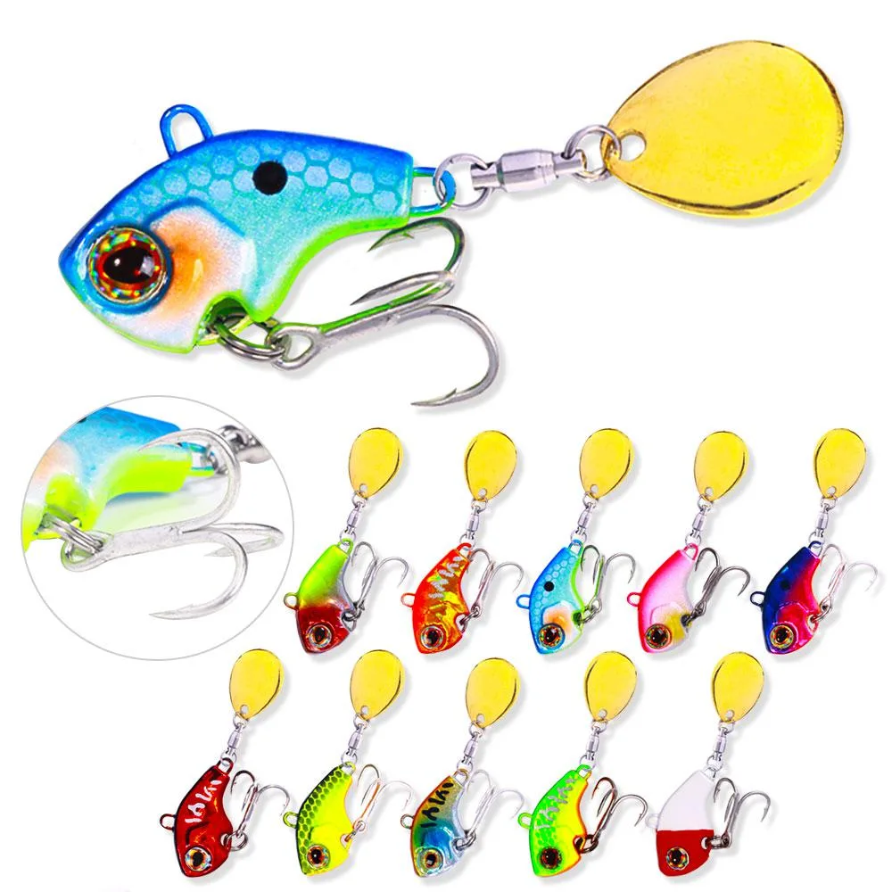 Ten small metal spoon lures with spinner tails in assorted colours