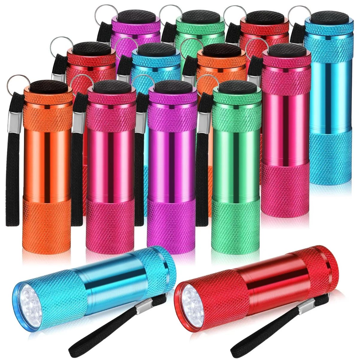 Twelve small rectangular aluminium flashlights in bright colours with lanyards, loose on a surface