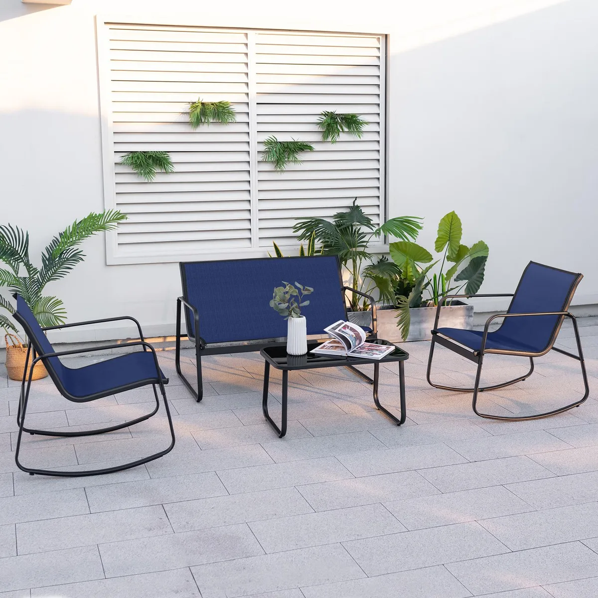 Navy four-piece patio rocking set with glass-top table and metal frames