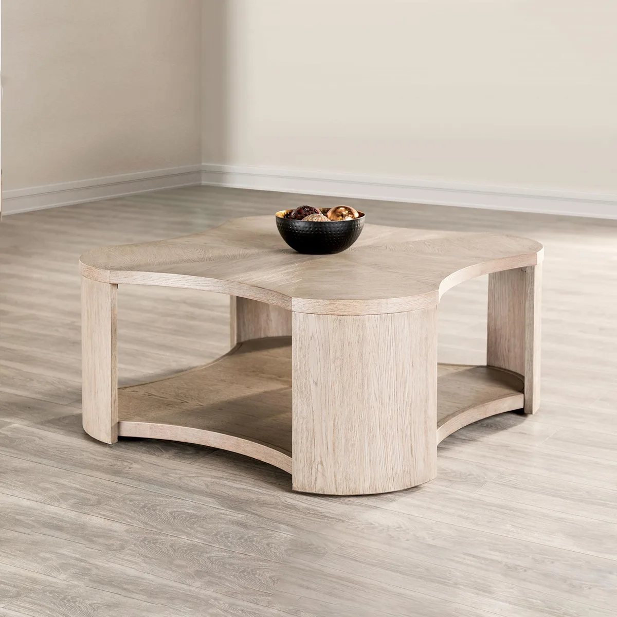 Rectangular oak-finished coffee table on four casters with open lower shelf