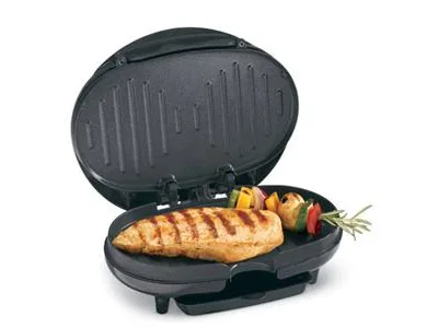 Black compact electric skillet with nonstick surface and drip tray