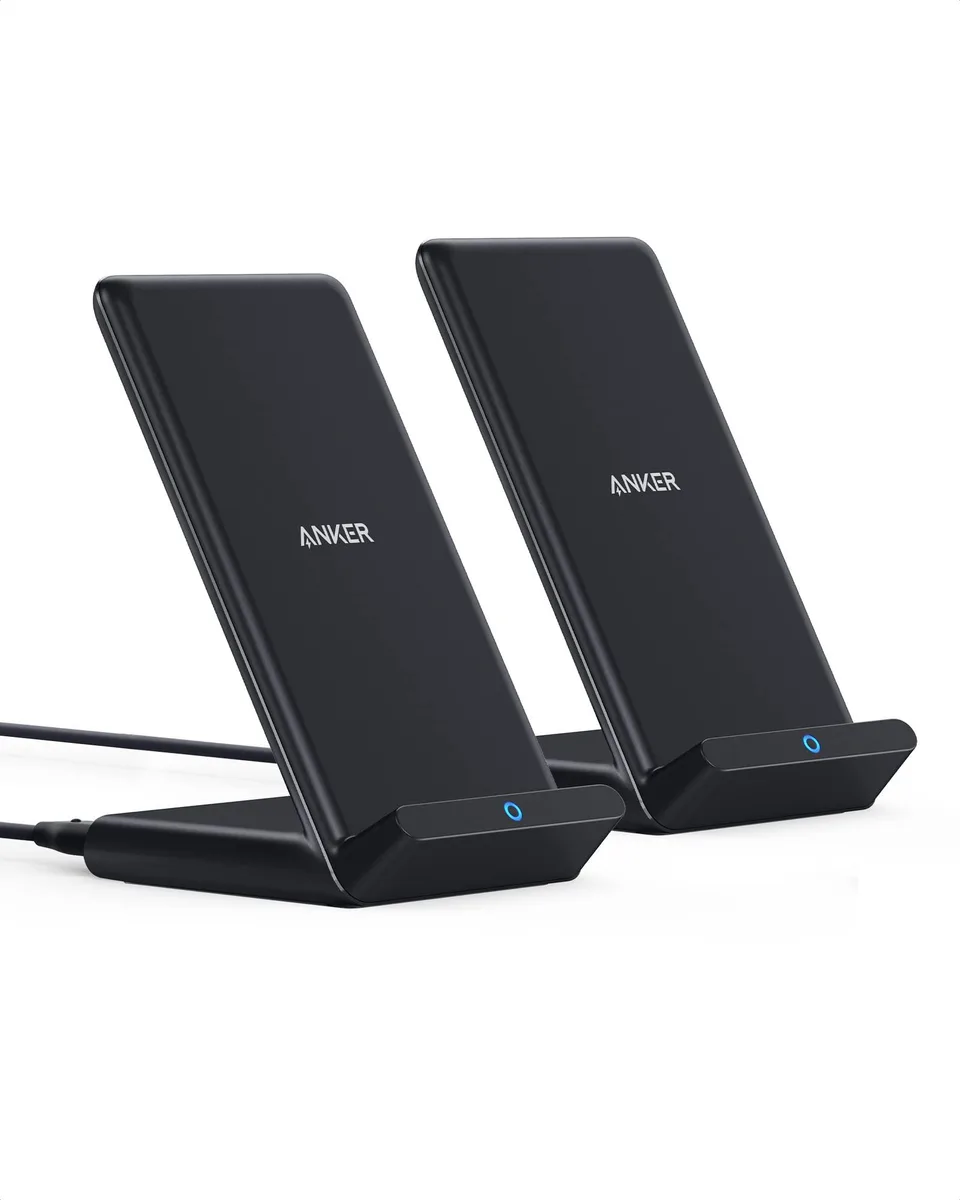 Two black Anker 313 wireless charging stands with phones in portrait and landscape orientation