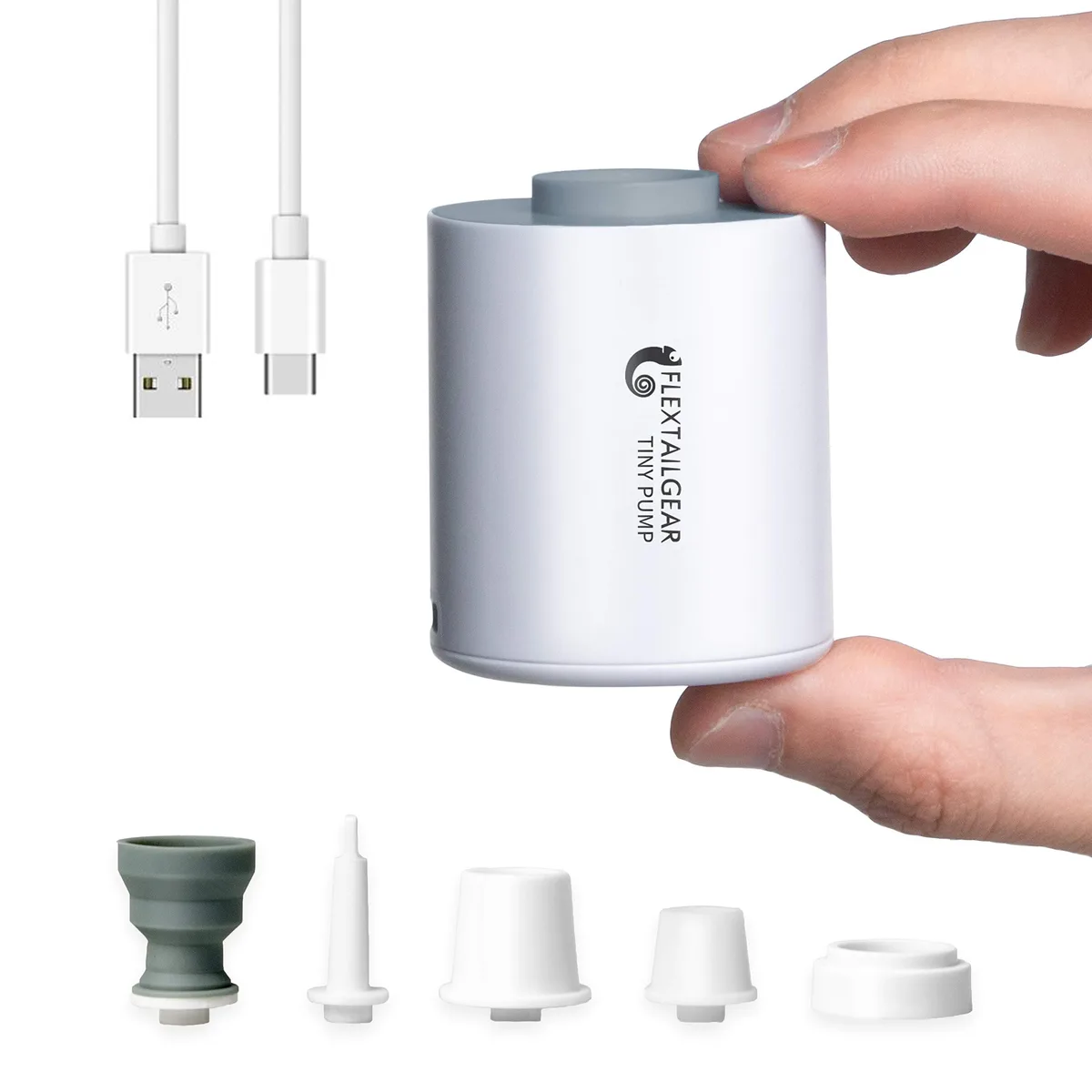 Tiny white rectangular pump with USB-C port, twelve in a box