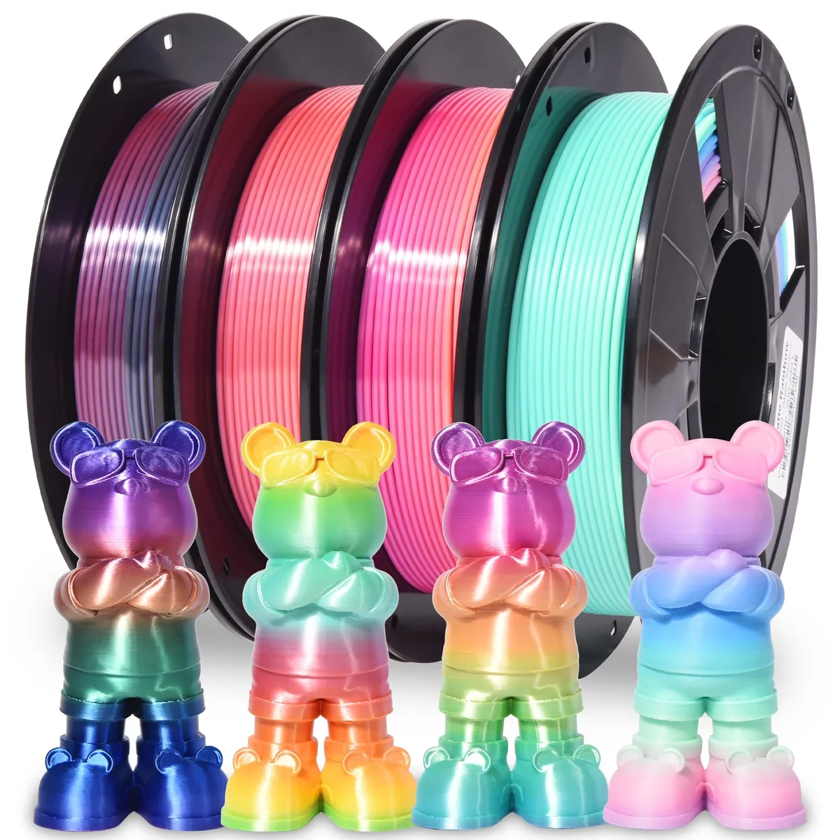 Four small spools of multicoloured PLA filament in cardboard box