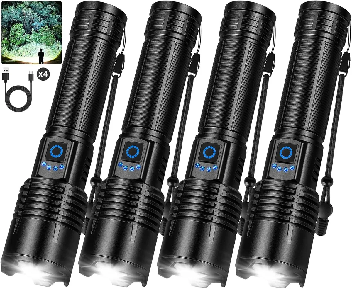 Four cylindrical aluminium flashlights with USB-C ports lying side by side