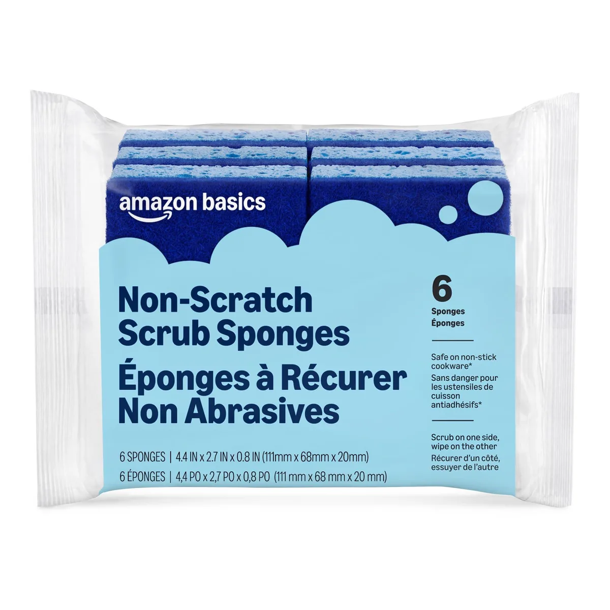 Six rectangular white sponges with textured scrub side and smooth wipe side in open packaging