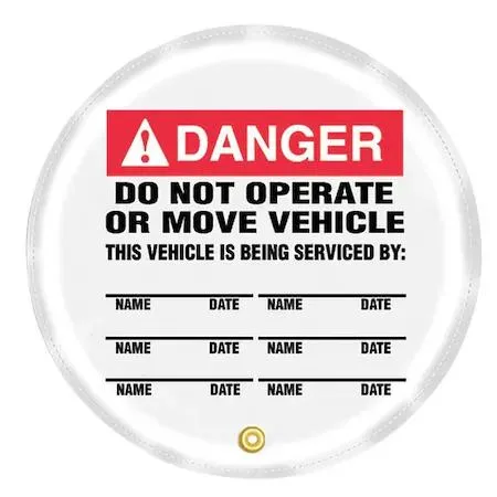 Red and white vinyl steering wheel cover with Do Not Operate warning text, 16 inch diameter