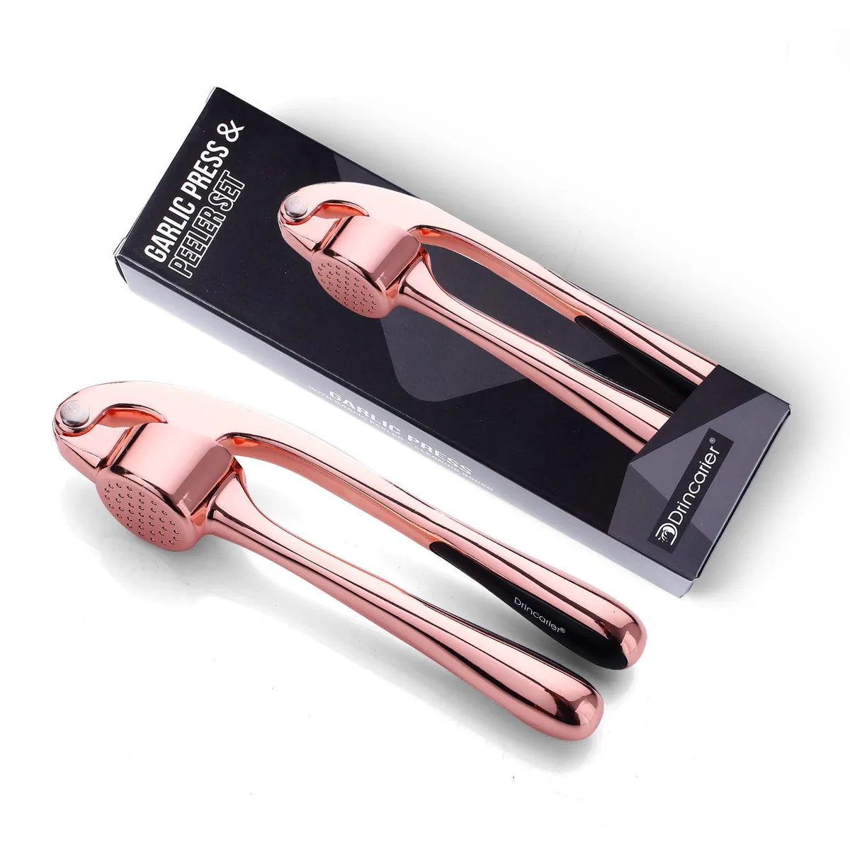 Rose gold metal garlic press with ergonomic handles, 18 cm long