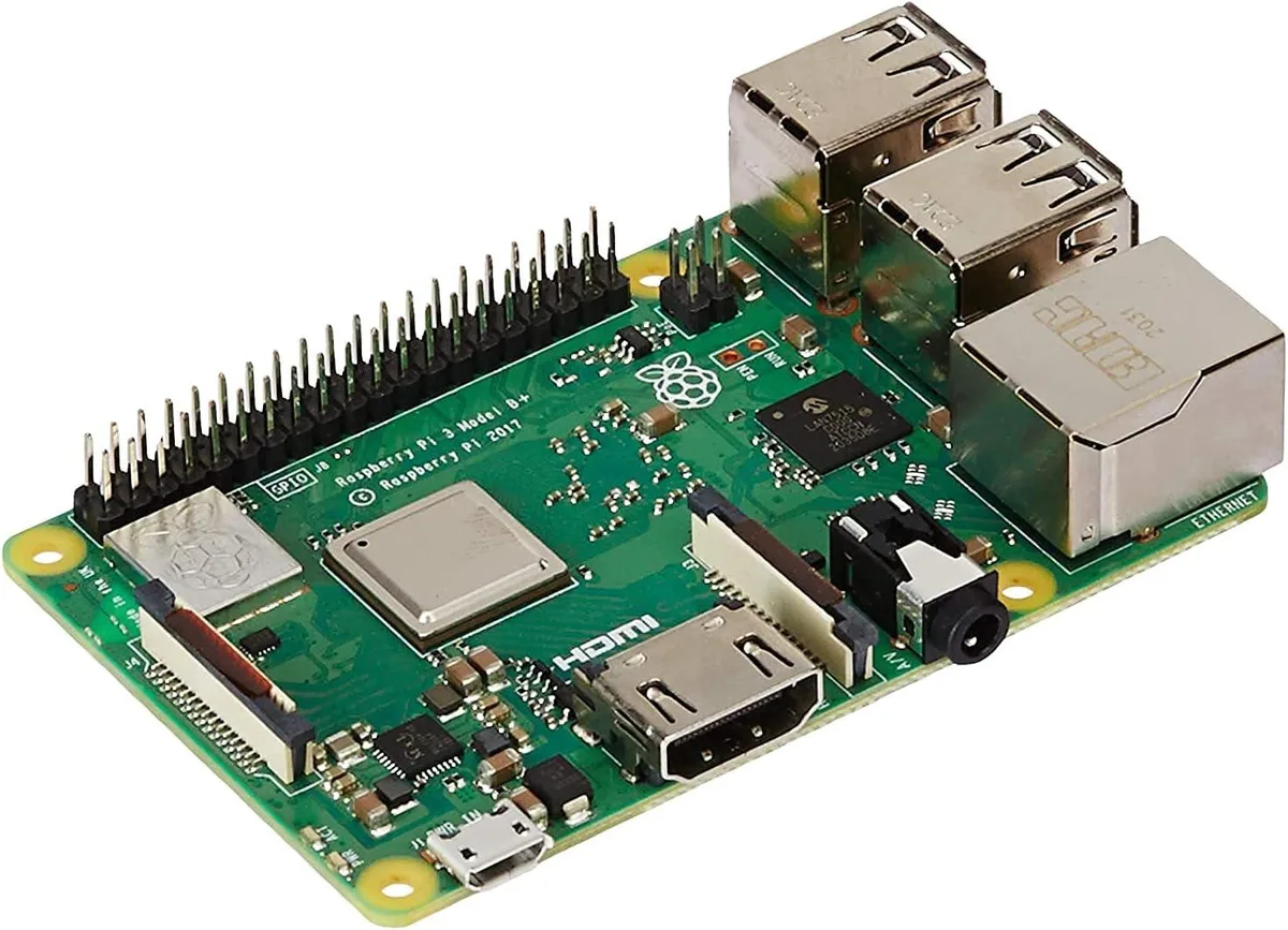 Green single-board computer with silver ports and black components