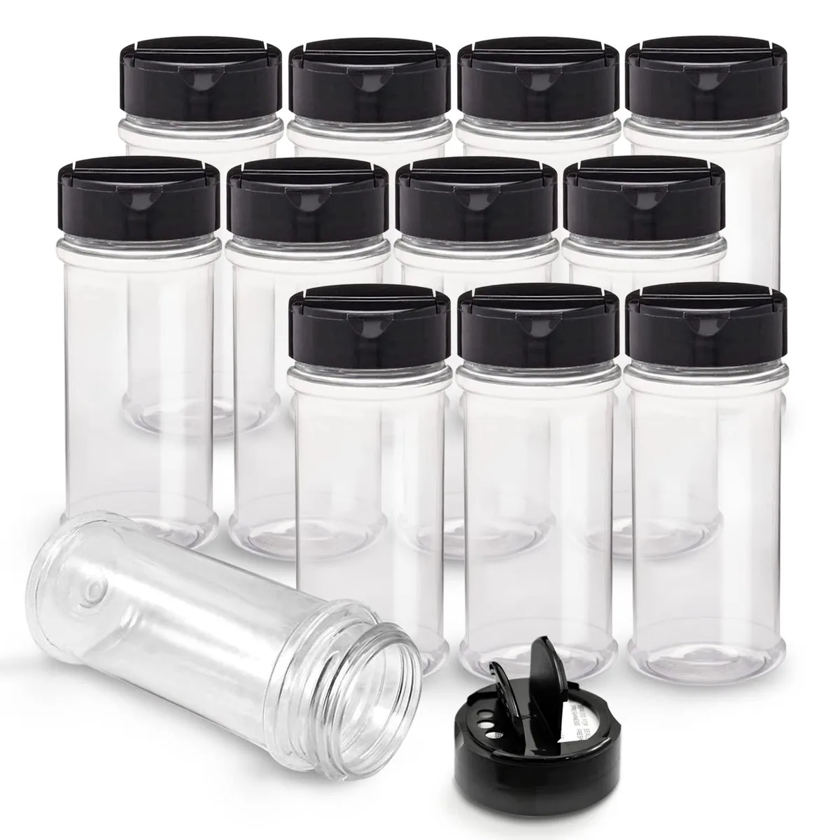 Twelve clear plastic spice jars with black flip-top caps in red packaging