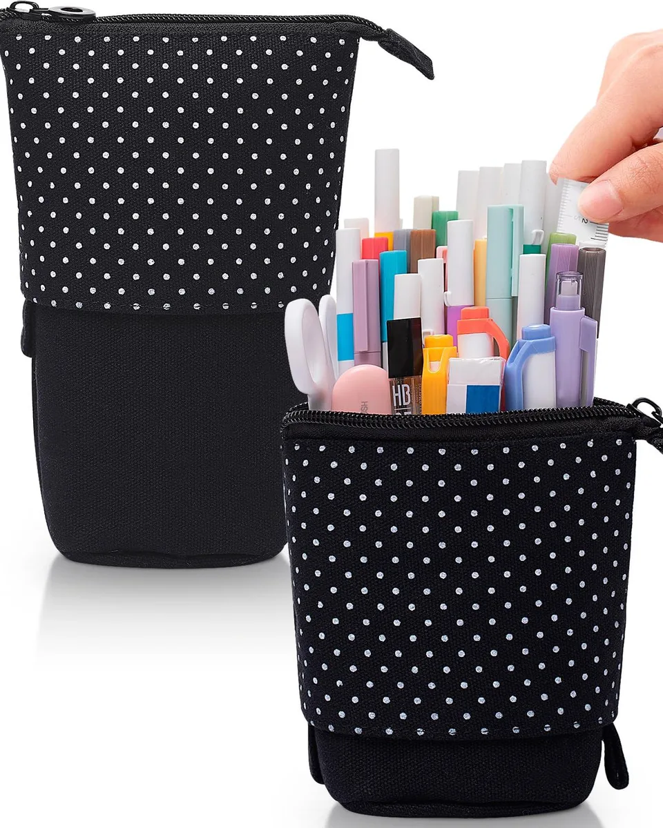 Beige canvas standing pencil case with polka dot pattern, retractable design, sturdy base, metal zipper
