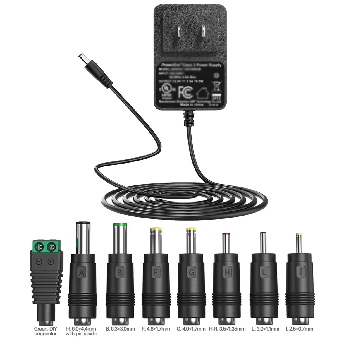 Black Dell USB-C power adapter brick with barrel connector and interchangeable tips