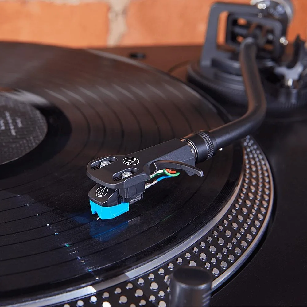 Blue headshell with black cartridge mounted, turntable accessory