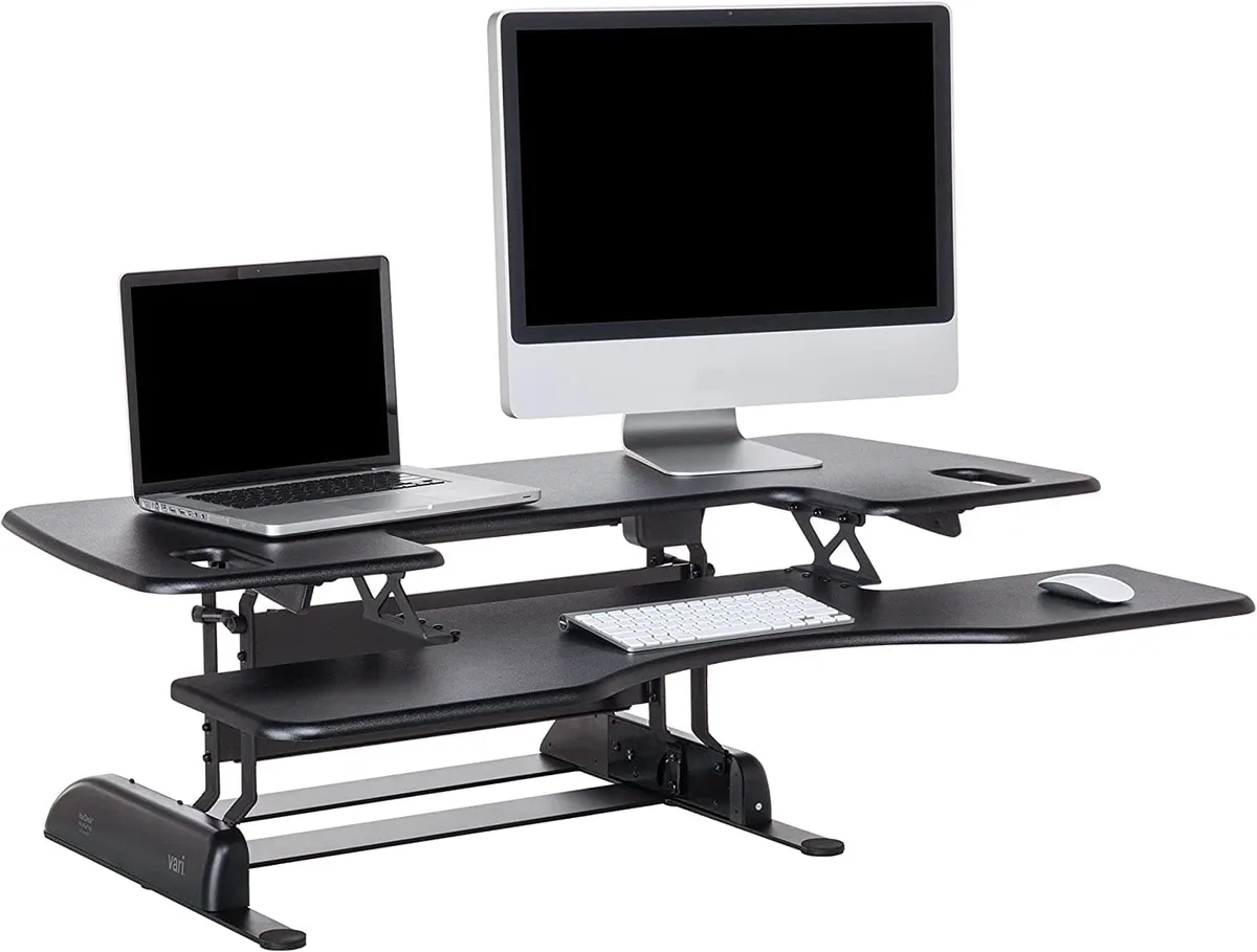 Black two-tier desk converter, 48 inches wide, dual handles, spring-assisted lift, fully assembled