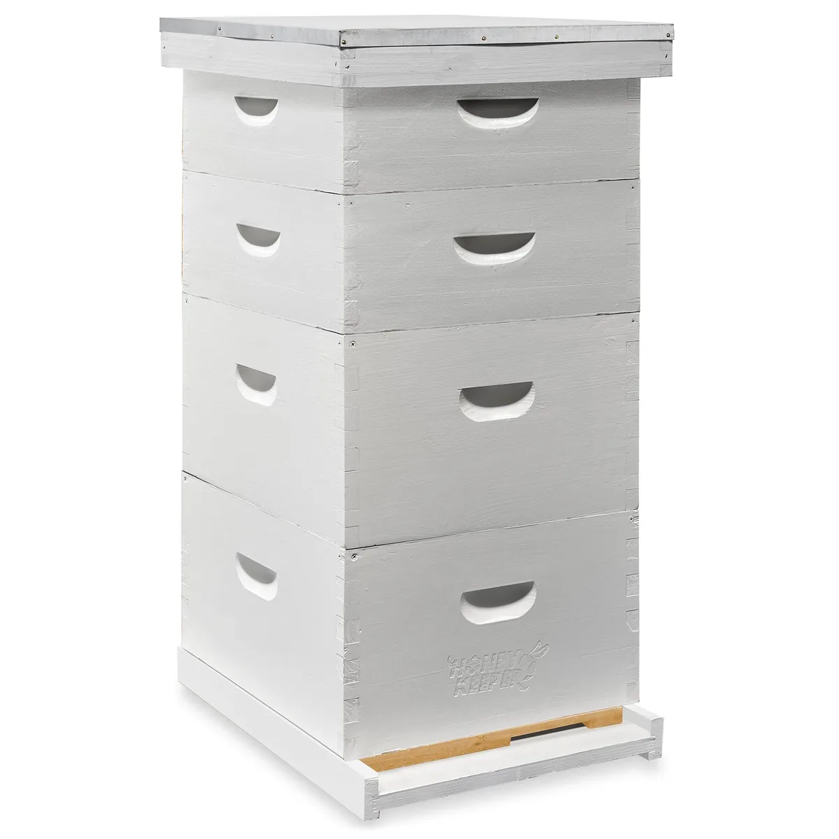 White painted wooden beehive stack with four boxes and telescoping cover