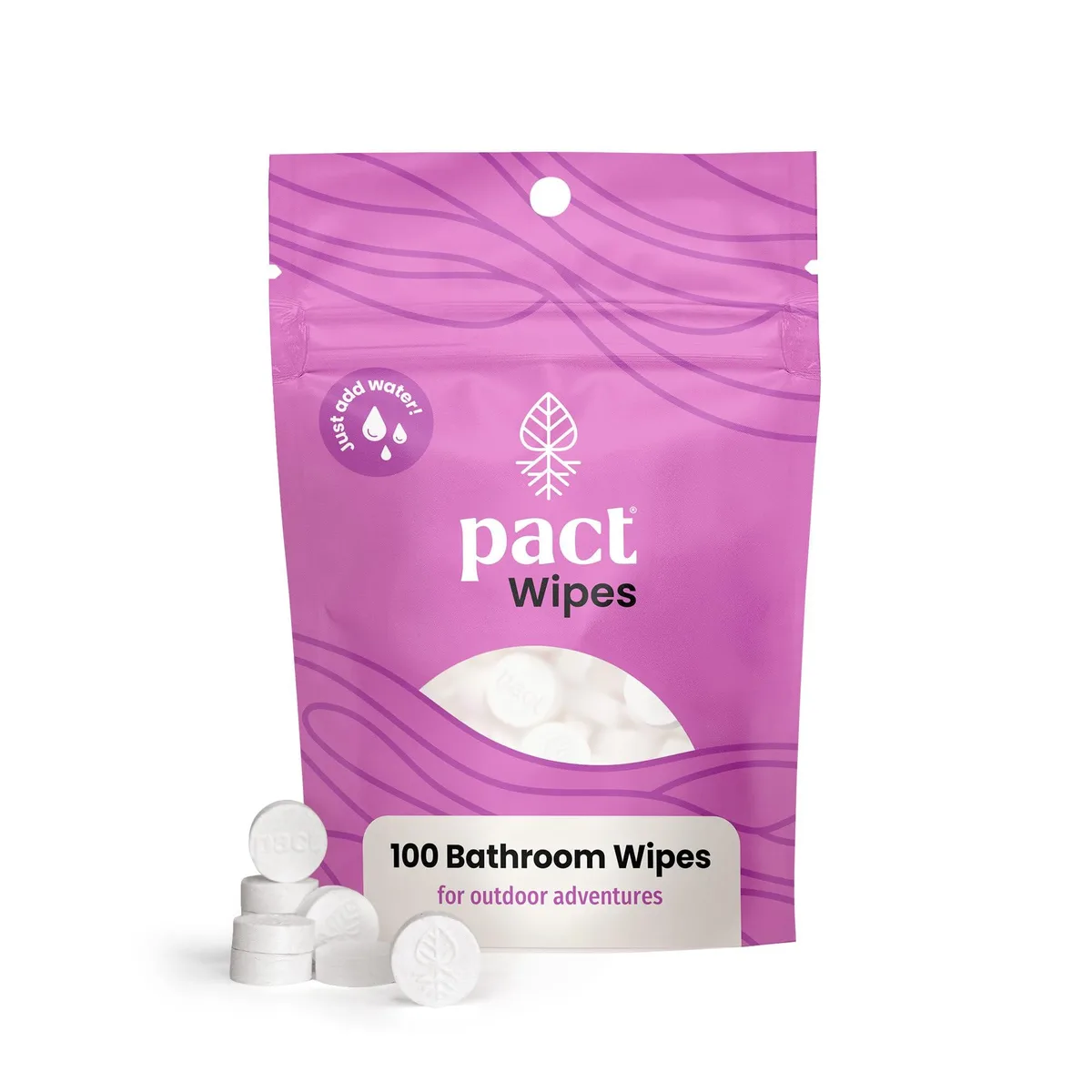 Small white compressed wipes in a compact pack, expand with water into large towels