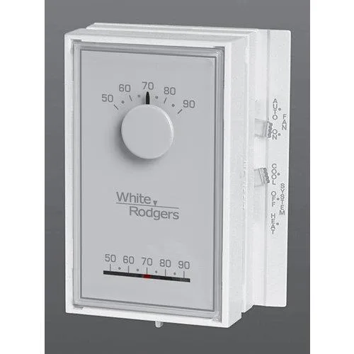 White rectangular thermostat with vertical mounting and terminal labels visible