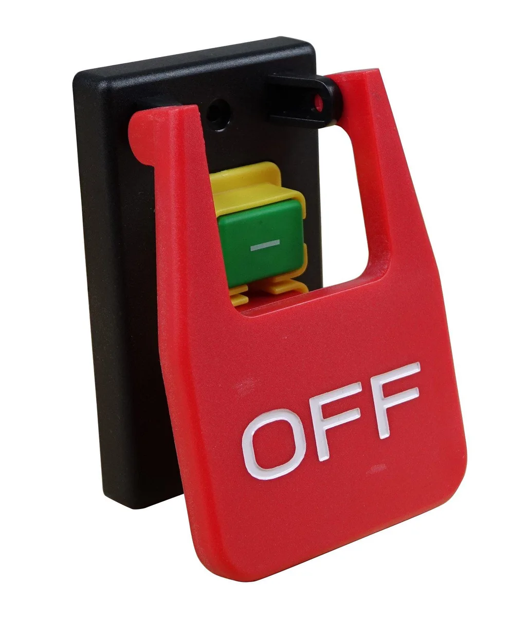 Rectangular plastic safety switch with large red knee paddle and green recessed on button