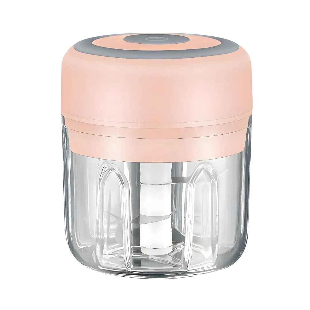 Small pink food processor with a compact round cup and motor base