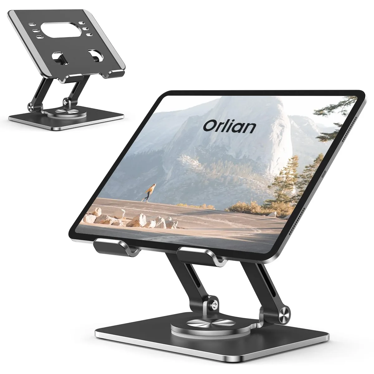 Black aluminum tablet stand with thick circular base and dual adjustable arms, folded flat