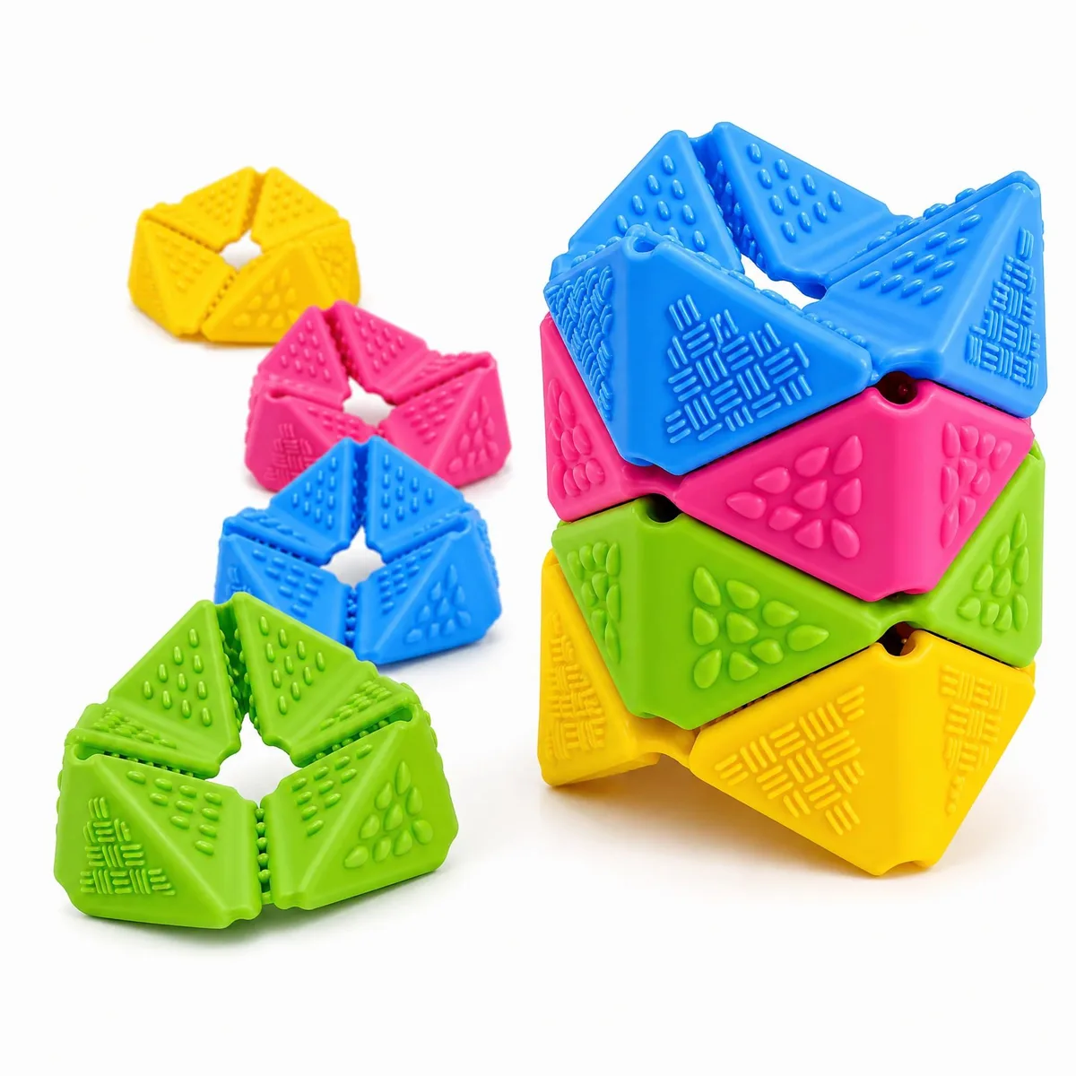 Four textured silicone flip cubes in bright colours, compact cube shape, matte finish