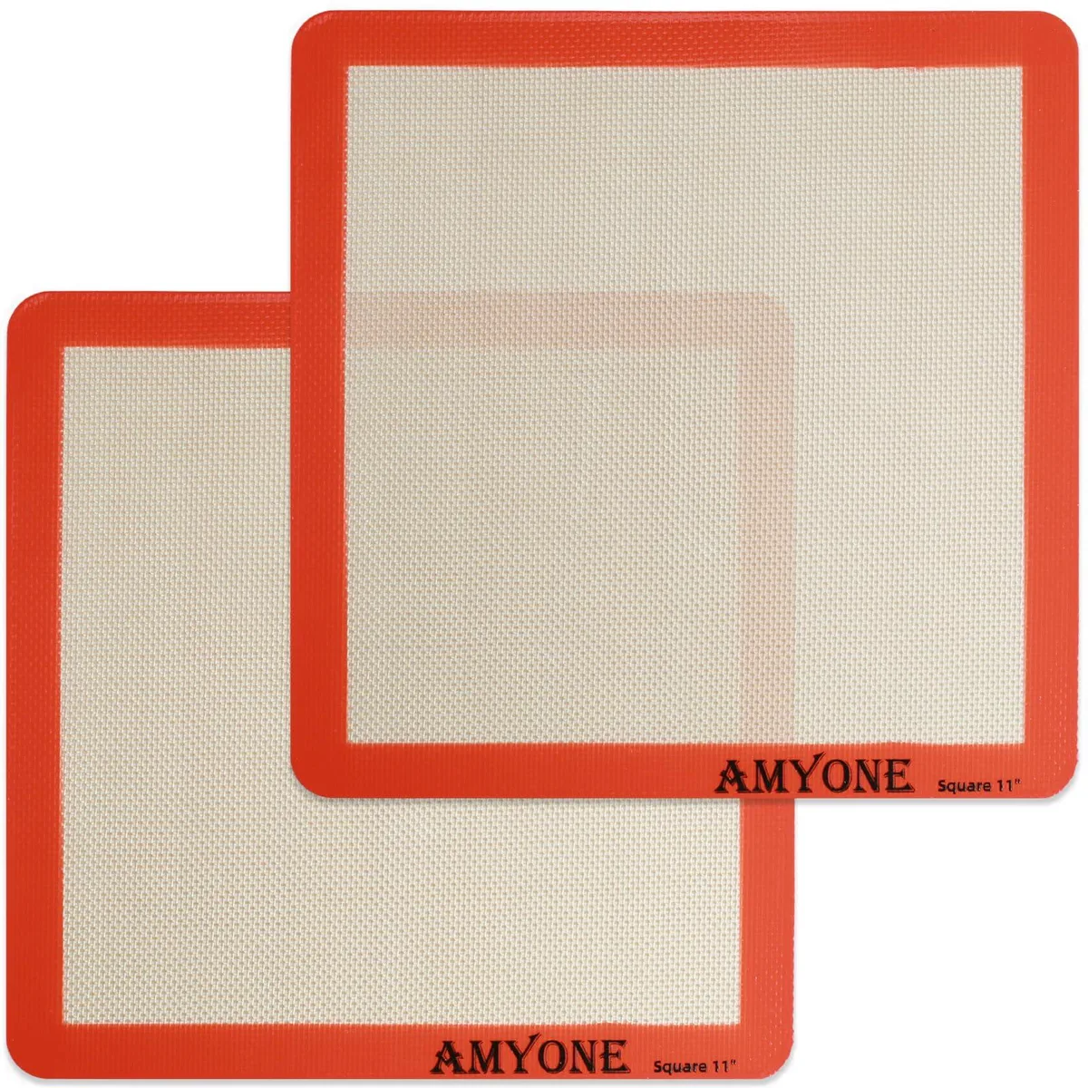 Two bright orange square silicone baking mats with glossy finish