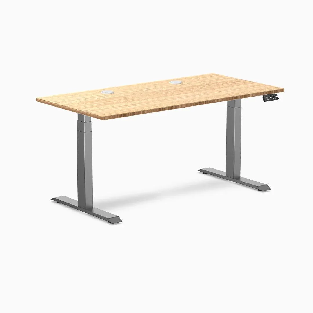 Desky Desky Dual Bamboo Sit Stand Desk 60 x 30 in Bamboo Space Gray Grommets office furniture — product photo
