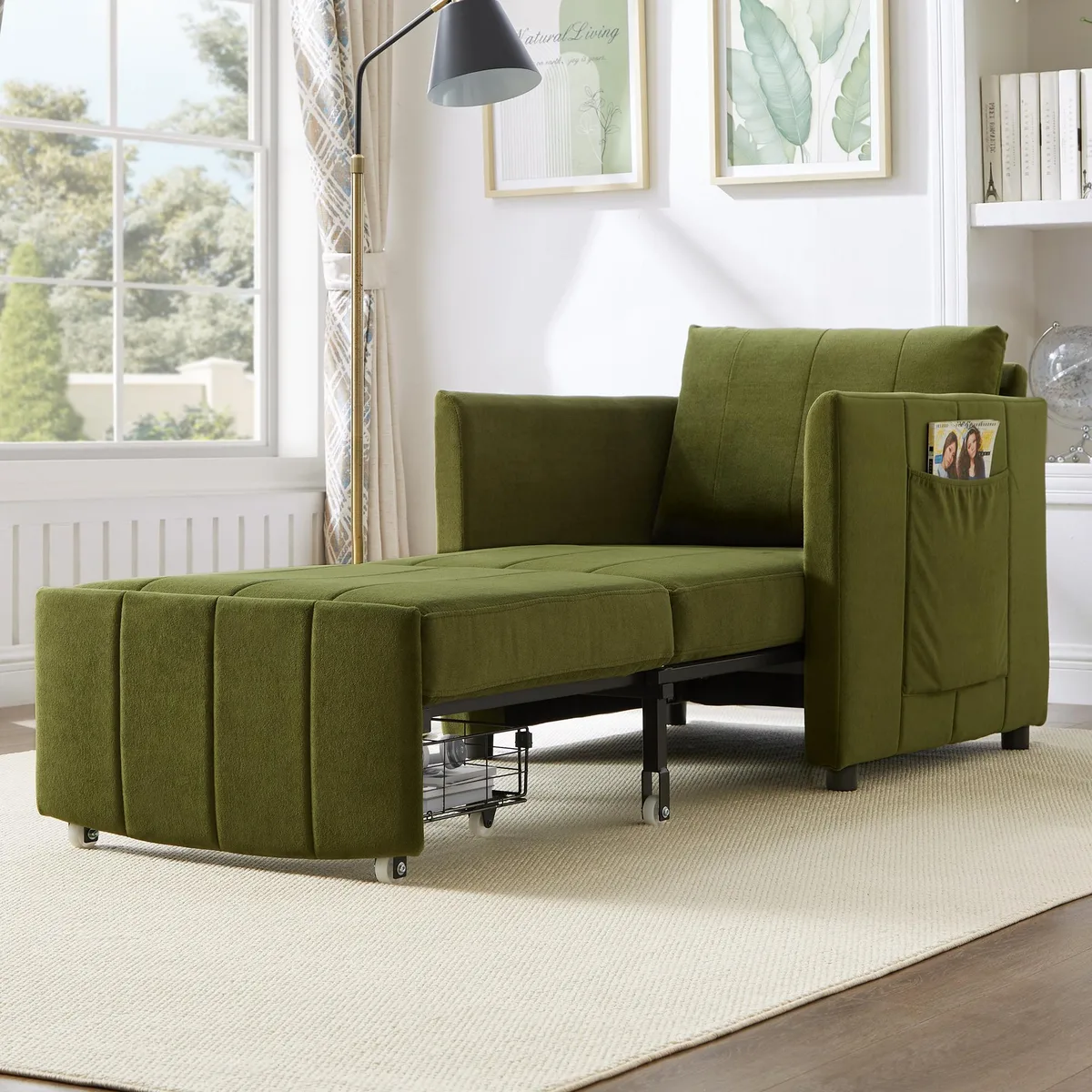Green chenille convertible sleeper sofa folded into chair form with side pockets and storage basket visible