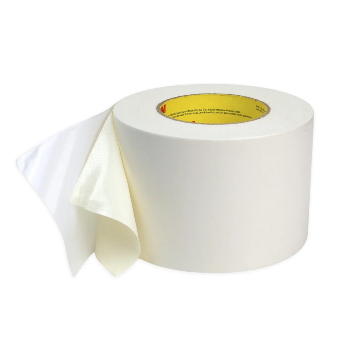 White double-sided cloth tape roll on 3 inch core