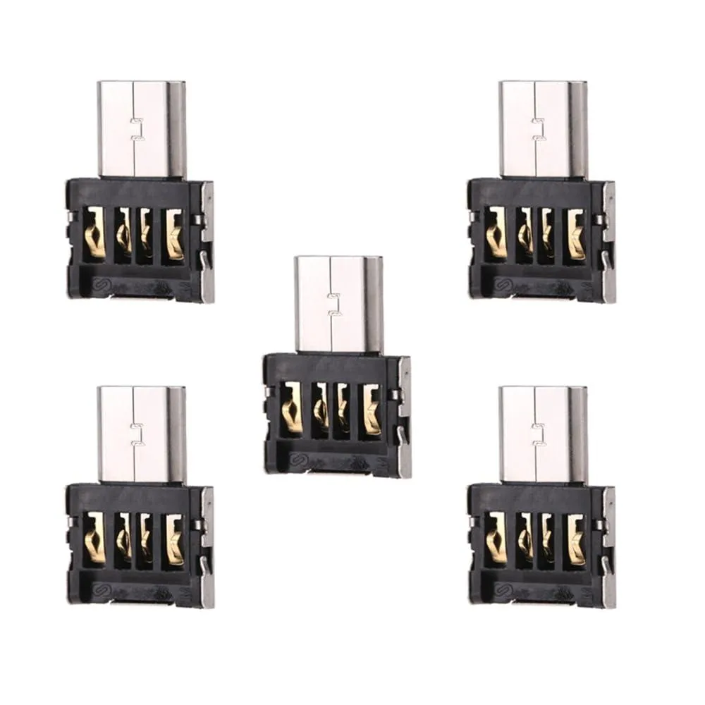 Five small Micro USB OTG adapters in a row