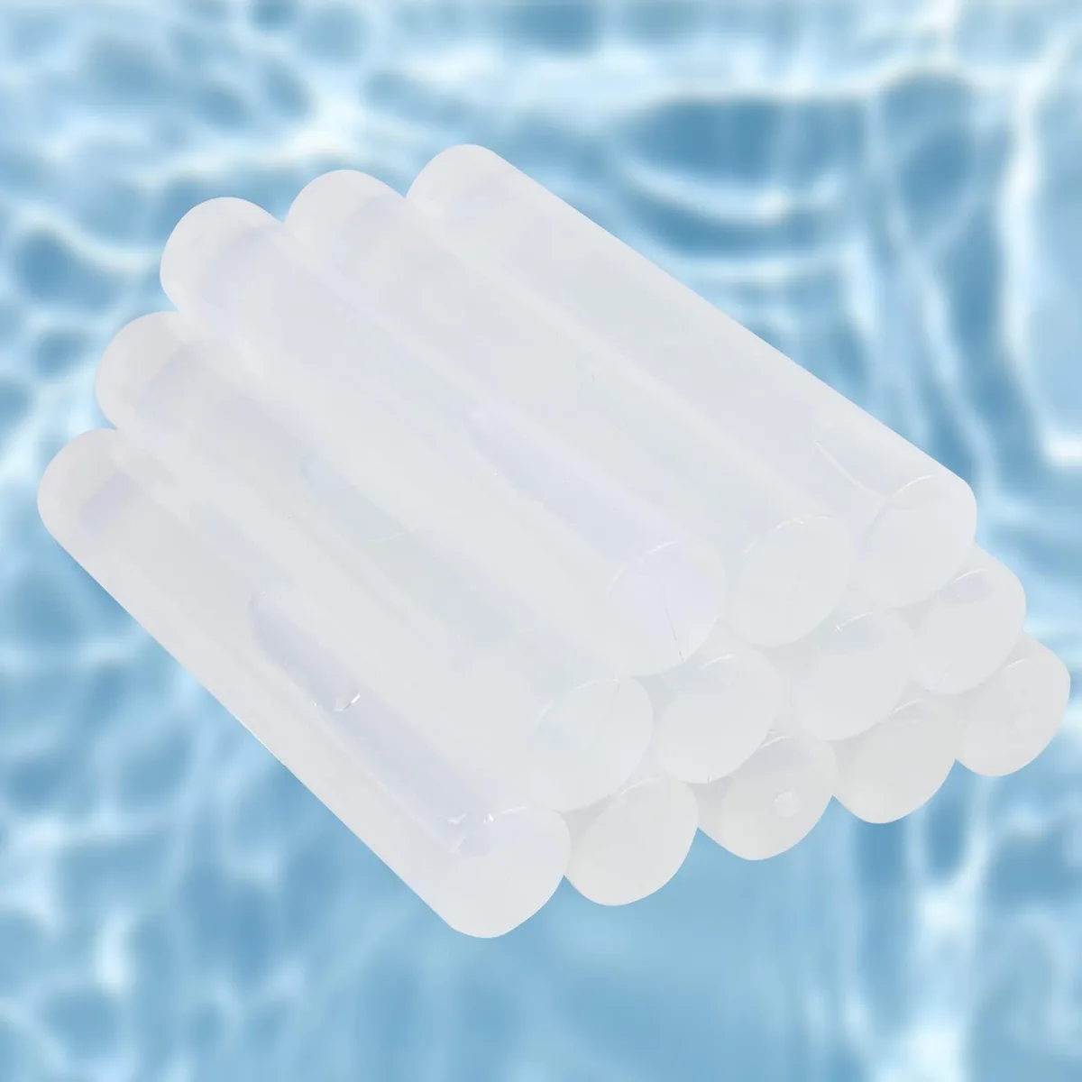 Twelve clear plastic ice sticks in a set